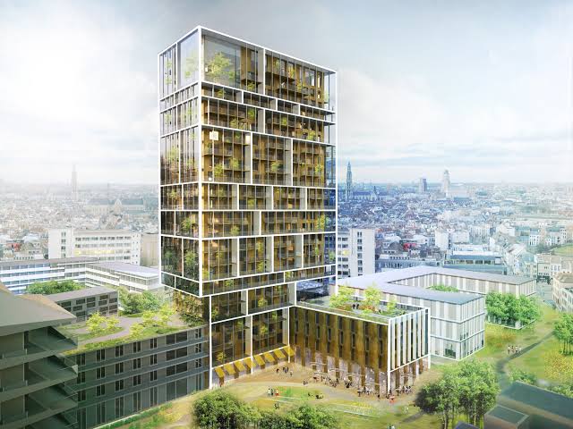 High-rise green residential tower with planted balconies
